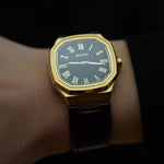 close video shot of the belvans heritage gold watch